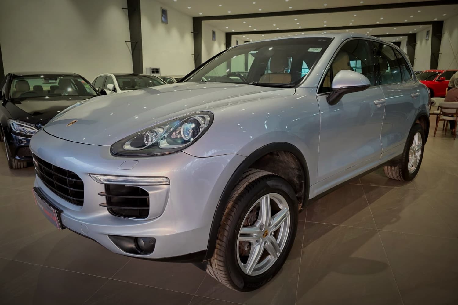Porsche Cayenne in Rhodium Silver at the showroom